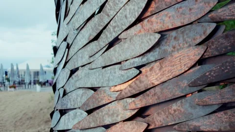 Macro detail of layered metallic fish scale patterns on Jurmala beach monument Stock Footage 344356331