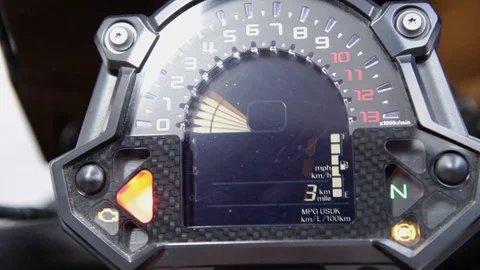 Macro detail on motorcycle dashboard startup Stock Footage 128661611