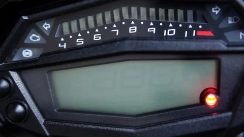 Macro detail on motorcycle dashboard startup Stock Footage 128661617
