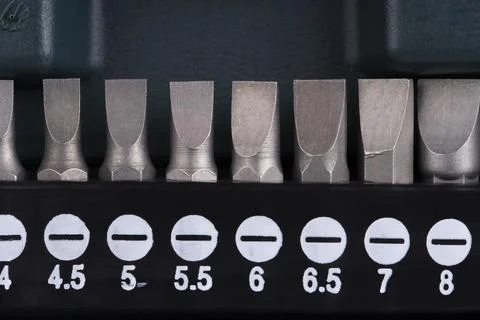 Macro detail of a set of flat screwdriver bits Stock Photos