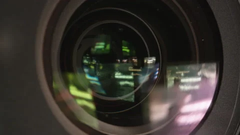 Macro detail shot of camera lense with colorful reflections in glass material Stock Footage 208762817