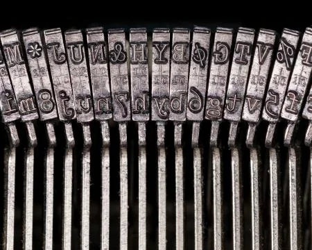 Macro detail of typescript inside electric typewriter Stock Photos