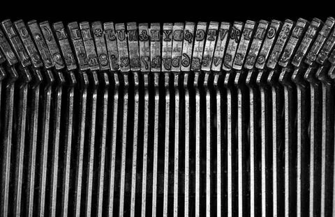 Macro detail of typescript inside electric typewriter Detail of the indivi... Stock Photos