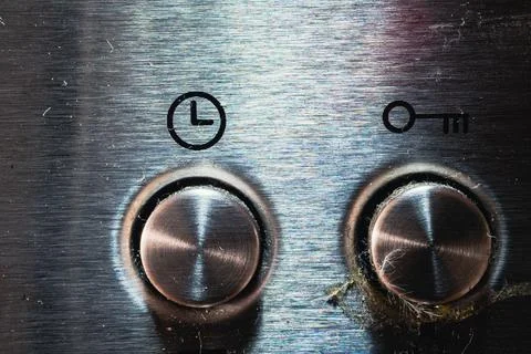 Macro details of the knobs on the oven Stock Photos