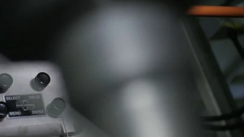 Macro Device with Regulators Scoreboard Settled in Factory Stock Footage