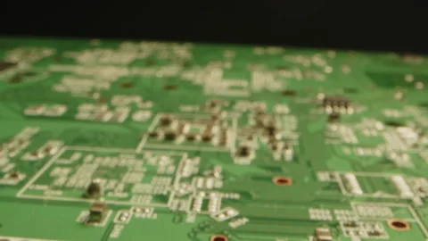 Macro dolly in of a printed circuit board in a black studio Stock Footage 315630219