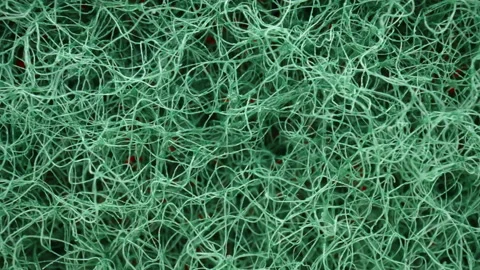 Macro dolly rough material green scrubbing sponge kitchen sponge texture Stock Footage 233894238