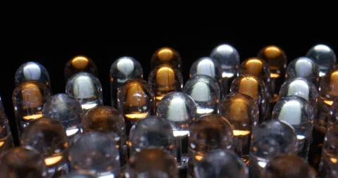 Macro dolly shot of LED light panel. Close up view of yellow and white diode Stock Footage 169654552