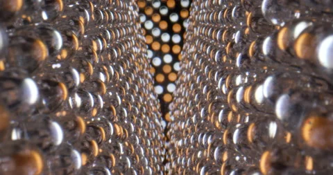 Macro dolly shot of LED light panel. Close up view of yellow and white diode Stock Footage 169655447