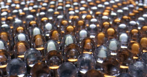 Macro dolly shot of LED light panel. Close up view of yellow and white diode Stock Footage 169783911