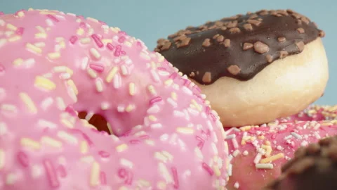 Macro dolly shot over sweet donuts Stock Footage