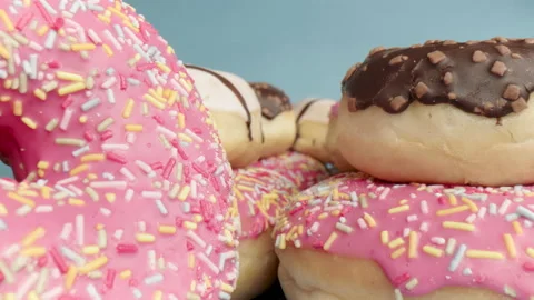Macro dolly shot over sweet donuts Stock Footage 134813495