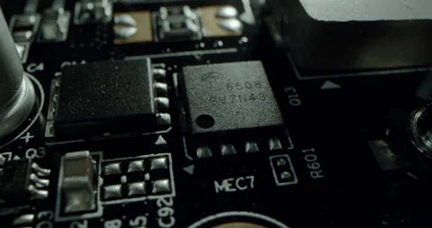 Macro dolly shot side view of a computer electrical circuit with cip, slots Stock Footage 310913960