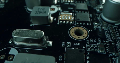 Macro dolly shot side view of a computer electrical circuit with cip, slots Stock Footage 310914246