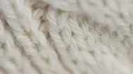 Macro Dolly Shot Of Soft Warm White Woolen Fabric To Keep Warm In Winter. Stock Footage