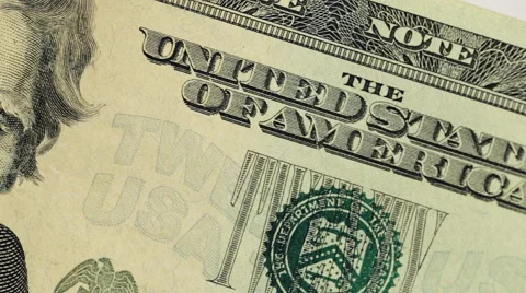 A macro dolly shot of a twenty dollar united states bill Stock Footage 62576273