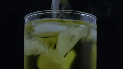 Macro dry ice dropped into bubbling smoking drink Stock-Footage 70705960