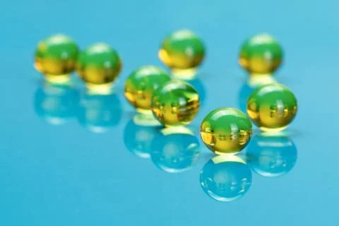 Macro of e vitamines on blue Stock Photos