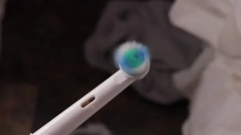 Macro of electric brush rotation, clean bristles creating shine and rhythm,.. Stock Footage 319825648