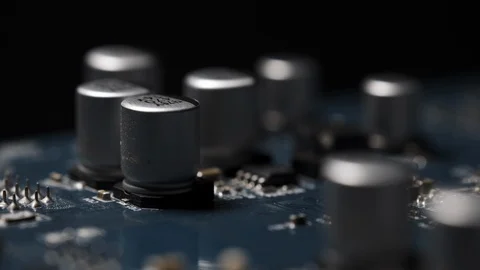 Macro Electronic Circuit, Microchips, Transistor, Capacitor, Computer Board. 4k Video stock 129515784