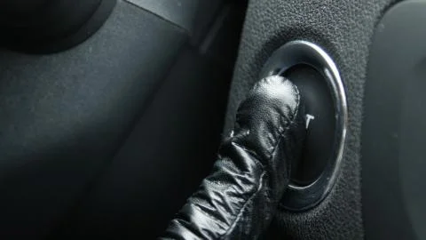 Macro engine start and stop button of a car. Foto stock