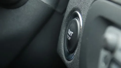 Macro engine start and stop button of a car. Stock Photos