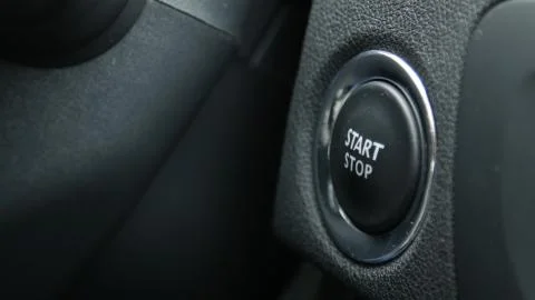 Macro engine start and stop button of a car. Foto stock