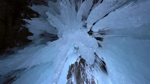 Macro epic sharp icicles crystal transparent ice frozen cave Lake Baikal Siberia Stock Footage 317963463