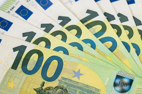 Macro of euro banknotes overlapping, angled composition shows repeated numera Stock Photos
