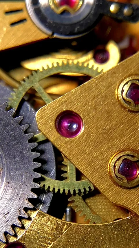 Macro Extreme Close Up of Mechanical Watch Movement Gears with Ruby Jewels Видео 346223439