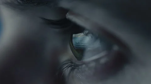 Macro eye of a boy in the night watching tv Stock Footage 218320658