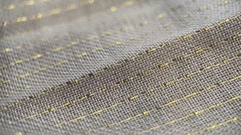Macro Fabric Texture With Golden Thread Stock Footage 248317954