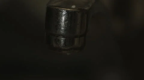 Macro faucet dripping Stock Footage 63050535