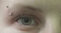 macro of female blue eye with piercing - macro HD Footage