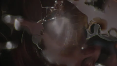 Macro of Ferromagnetic Fluid Moving under Microscope Stock Footage 280838960