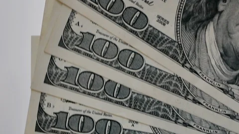 Macro of few one hundred dollars banknotes Stockbeeldmateriaal 102065305