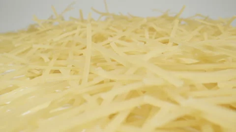 MACRO: Figural noodle on a white background, Dolly shot Vídeo Stock 166028533