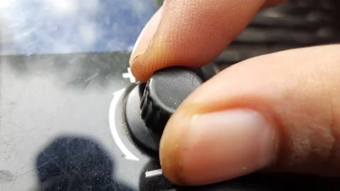 Macro Finger Adjusting Black Rotary Volume Knob 動画素材 310177003