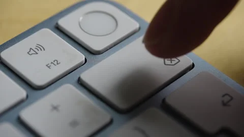 Macro Of Finger Pressing Backspace Key On Modern White Keyboard Stock Footage 328344383