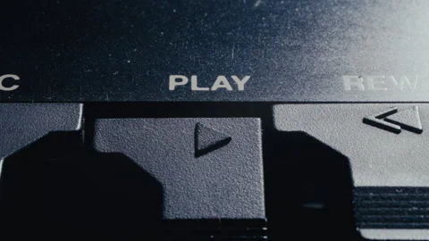Macro of Finger Pushing Down Play Button on Analog Audio Device 库存影片 342452424