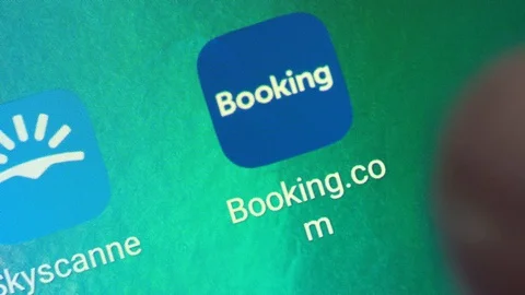 Macro of a Finger Touching Booking App on a Smartphone, in USA 2018 Stock Footage 120239494