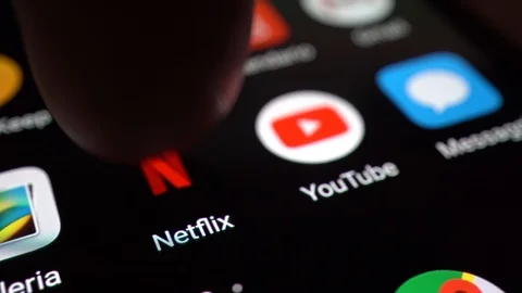 Macro of a Finger Touching Netflix App on a Smartphone, in USA 2018 Stock Footage 99980490