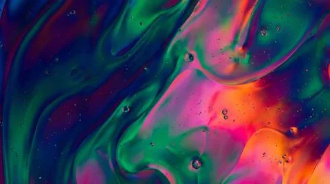 Macro fluid art texture showing vibrant pink and green oil bubbles in color.. Stock Illustration