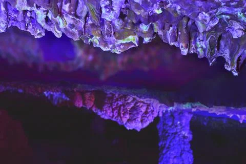 Macro Fluorescent Cave Formations Under Black Light with Neon Colors and Te.. Stock Photos