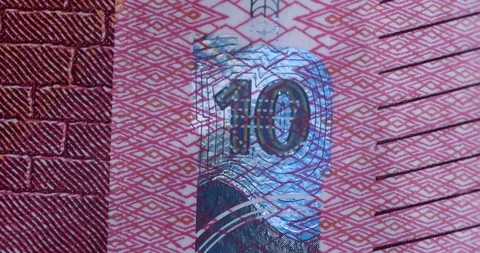 Macro of foil on 10 Euro note as a light passes  Stock Footage 110663214