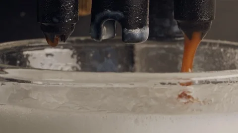 Macro footage of espresso machine preparing a latte cup with foamed milk Stock-Footage 107776545