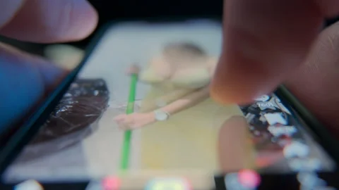 Macro footage of hands scroll through the news feed in social networks. Close up Stock-Footage 230036720