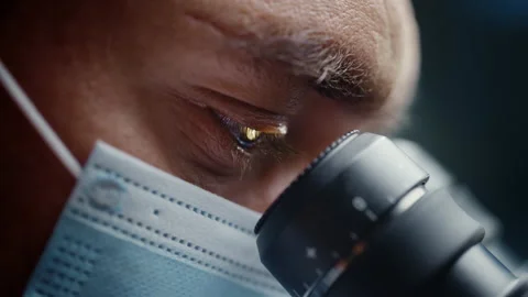 Macro Footage Scientist Using Microscope in Laboratory 스톡 동영상 146068588