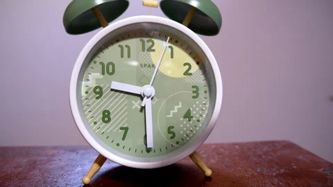 Macro Front View of Antique White and Green Twin-Bell Clock Stock Footage 338294471