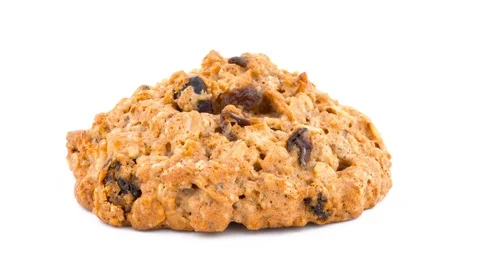 Macro of a full frame one oatmeal raisin cookie rotating on the turntable. Stock Footage 94899823
